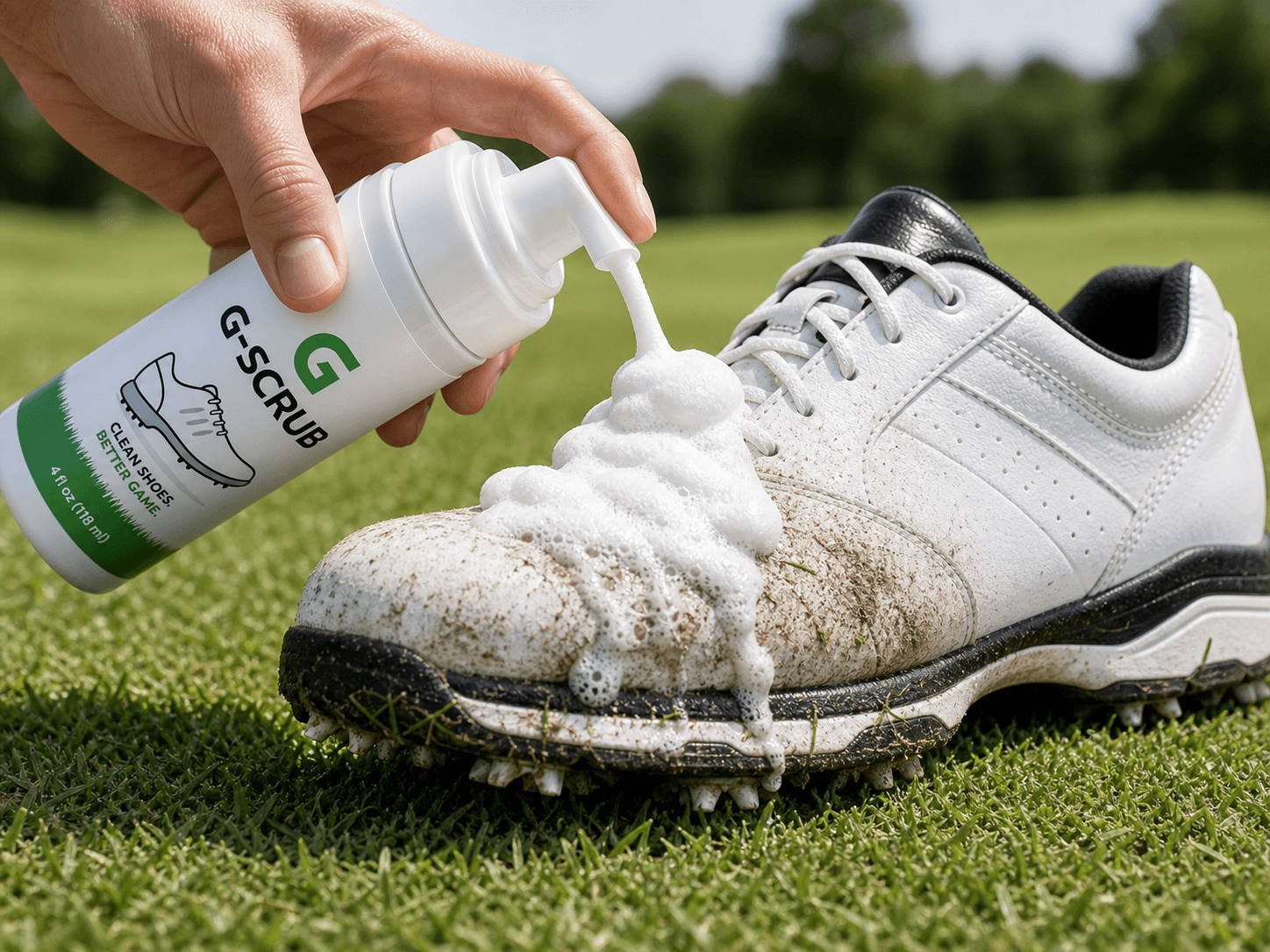Applying G-SCRUB foaming cleaner to a dirty golf shoe